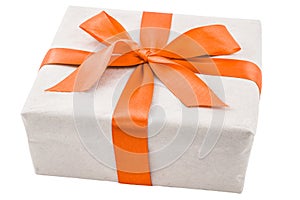 Gift box with orange ribbon bow isolated on white background