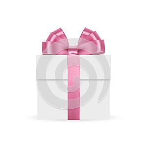 Gift box with pink bow isolated on white backdrop