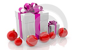 Gift box with pink ribbon and red Christmas balls