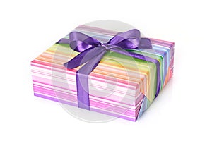Gift box with purple ribbon