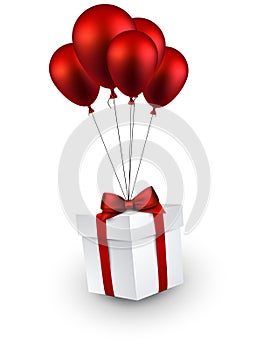 Gift box on red balloons