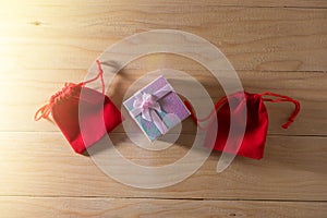 Gift box and Red Gift Bag wrapped Christmas and Newyear presents with bows and ribbons, Christmas frame boxing day background.