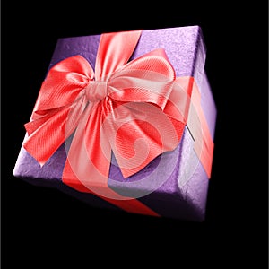 Gift box with red ribbon on black background. 3d