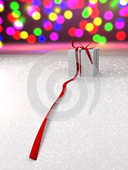 Gift box with red ribbon and colorful lights (focus at the end o