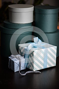 Gift box with ribbon on green backdround