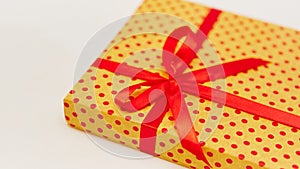 Gift box with ribbon on white background