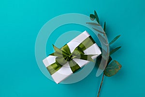 Gift box and spring flower on color background. Happy womens day. Happy Mothers day.Hello Spring- Image