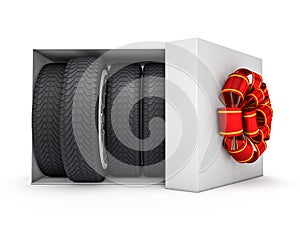 Gift box with tyres and wheels. 3D