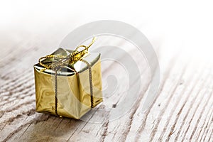 Gift box on wooden background