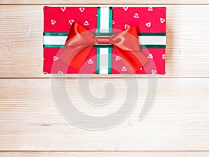 Gift box on the wooden floor