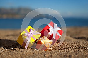 Gift boxes in a beach