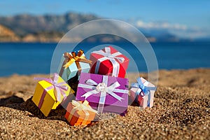 Gift boxes in a beach
