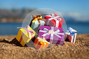 Gift boxes in a beach