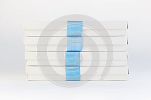 Gift boxes with blue ribbons on a white background