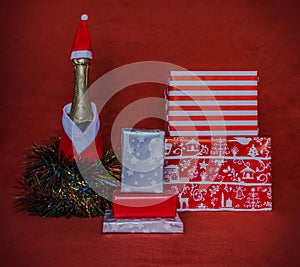 Gift boxes with champagne bootle photo