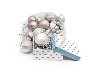 Gift boxes and Christmas decorations with silvered ribbons in white background