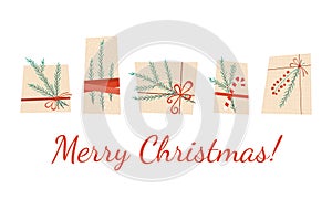 Gift boxes decorated with fir branches and red ribbons. Merry Christmas card. Set of presents.