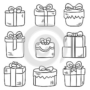 Gift boxes doodle hand drawn in black line vector set