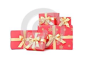Gift boxes with golden bow isolated
