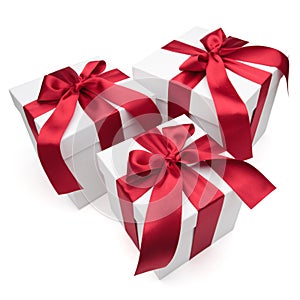 Gift boxes with red ribbons and bows.