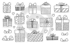 Gift boxes with ribbons set. Hand drawn doodle sketch.