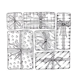 Gift boxes with ribbons set. Hand drawn doodle sketch. Isolated holiday items. Vector image