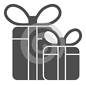 Gift boxes solid icon. Two presents with bow vector illustration isolated on white. Holiday package glyph style design