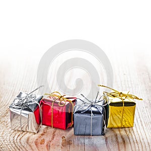 Gift boxes on wooden background