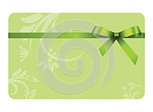 Gift Card With Green Ribbon And A Bow photo