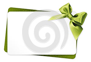 Gift card with green ribbon bow on white background