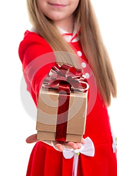 Gift it in the christmas girl`s hand, isolated over a white background, macro