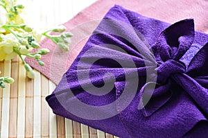 Gift in cloth wrapping