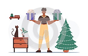 Gift concept for christmas or new year. A man holds a festive gift box in his hands.