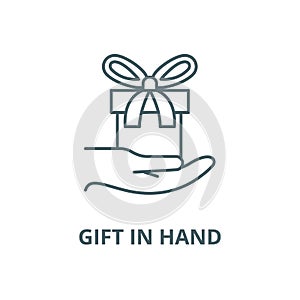 Gift in hand vector line icon, linear concept, outline sign, symbol