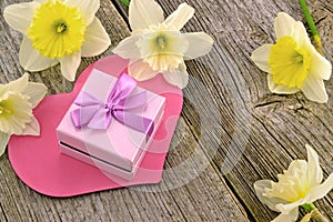 Gift with hearts and flowers