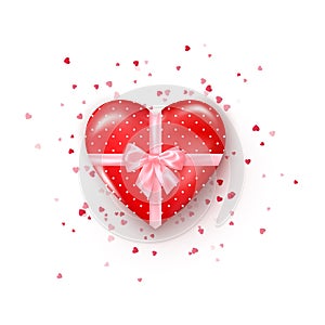 Gift in hearts shaped box with pink silk ribbon and bow. Present for Valentine`s day decorated confetti. Vector
