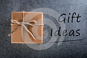 Gift ideas. Thinking about new year, Christmas, birthday and valentine day gifts and online shopping. Box symbolizing a