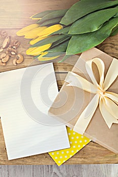 Gift, notebook, yellow tulips