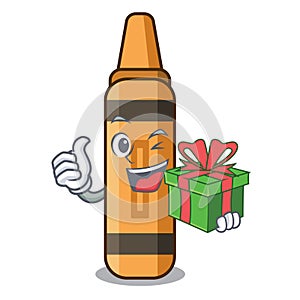 With gift orange crayon in the cartoon shape