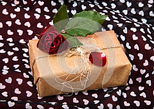 Gift Packed in craftool paper with a dark red rose