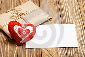Gift parcel, white blank label and red heart