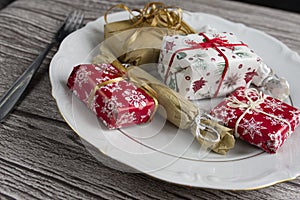 Dinner Setting with Gift. Suprize eating or gift dinner concept