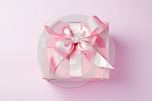 Gift present topped with a pink bow. Generative AI