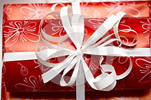Gift ribbon on red paper