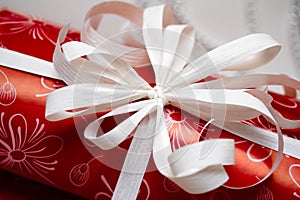 Gift ribbon on red paper