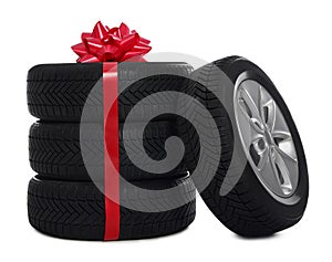 Gift set of wheels with winter tires on white background