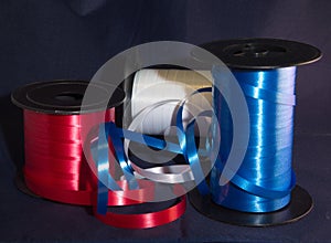 Gift strings on plastic reels