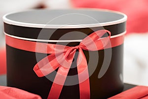gift surprise box with red ribbon