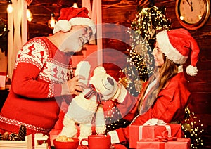 Gift surprise. Gift toy for kid. Boxing day. Happy childhood. Child enjoy christmas with bearded grandfather Santa claus