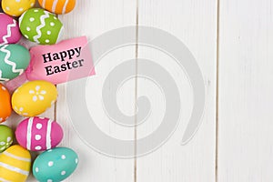 Gift tag with Easter egg side border against white wood